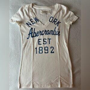 Abercrombie & Fitch White V-Neck Tee with Blue Graphic